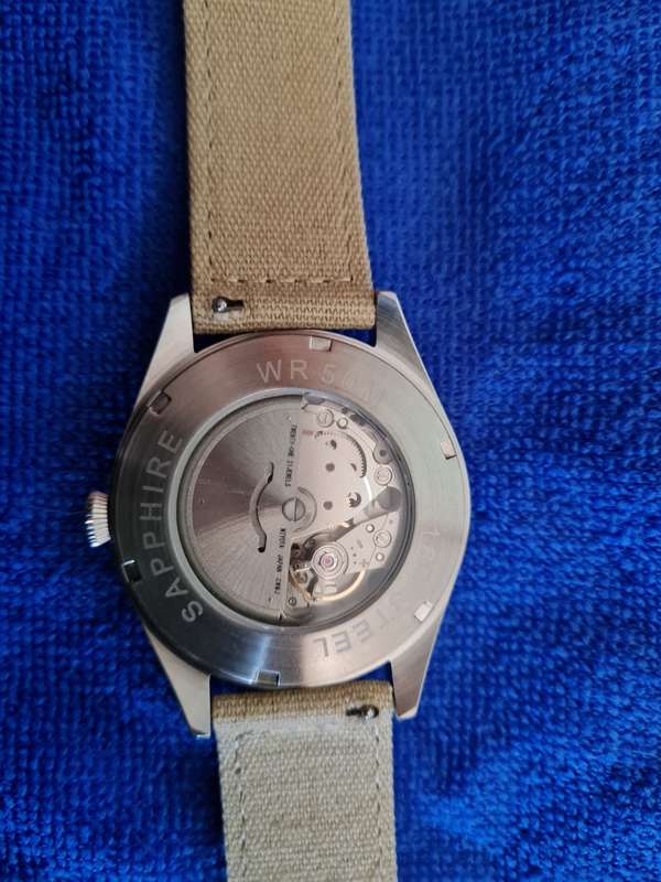 Pilot style automatic watch working.