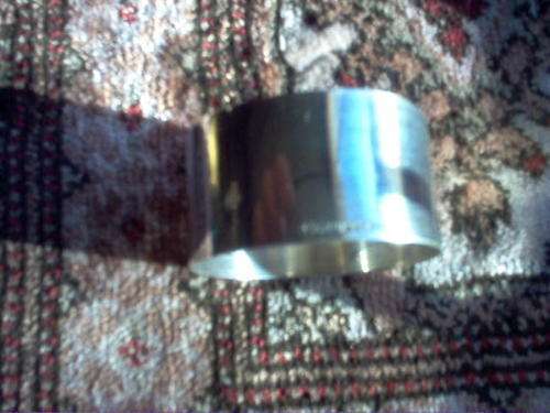SILVER SERVIETTE RING.