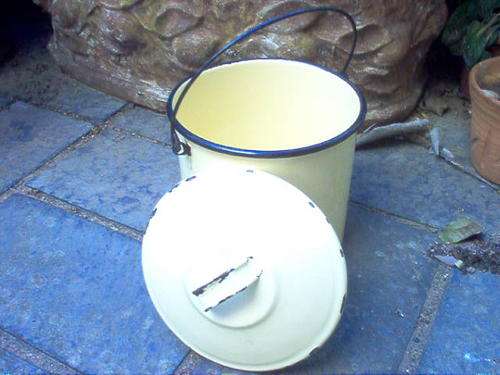 DARK CREAM WITH BLACK TRIM ENAMEL POT WITH LID.