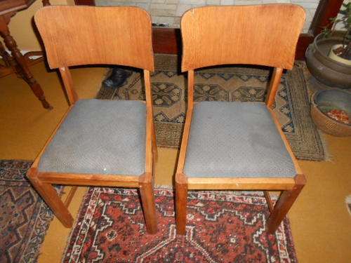PAIR LIGHT COLOURED CHAIRS PADDED SEATS.