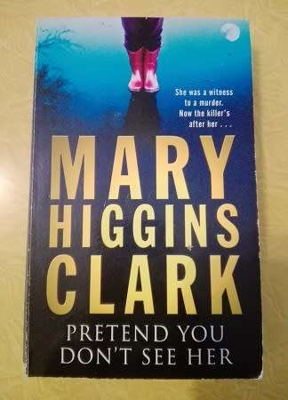 Mary Higgins Clark.  Pretend you don`t see her....