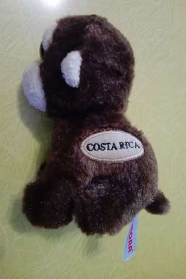 Minky the big eyed monkey.  Aurora Costa Rica plush toy.