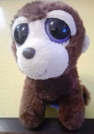 Minky the big eyed monkey.  Aurora Costa Rica plush toy.