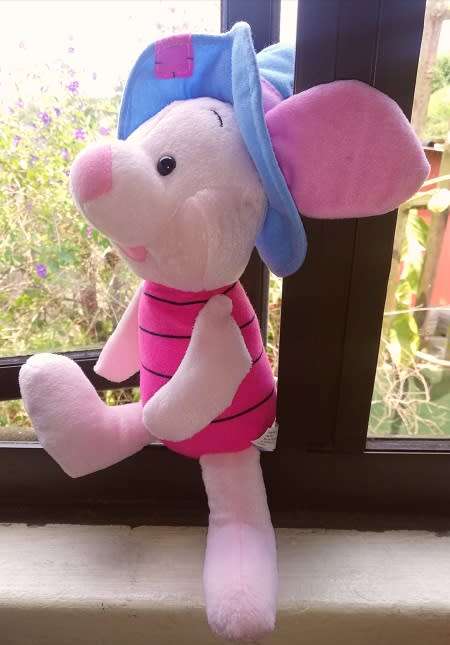 A lovely Piglet with a blue hat.  Plush toy!  Large 35cm.