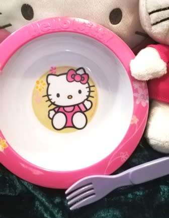 TY Hello Kitty plush toy doll , a round cushion and 1 bowl with a purple fork!