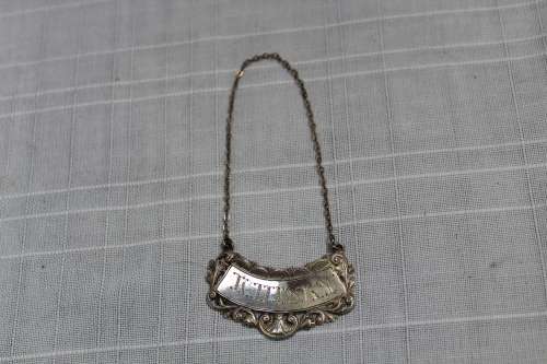 Sterling silver decanter label.....stunning!