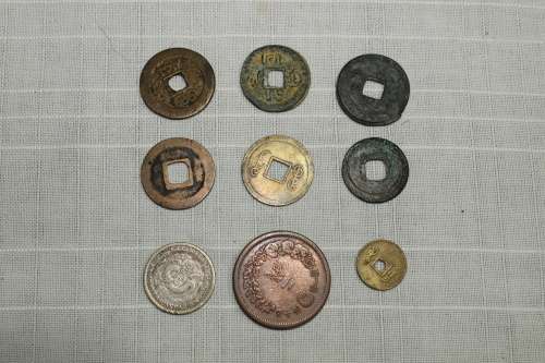 7 Chinese ancient coins plus one Japanese - all 1644 to 1911