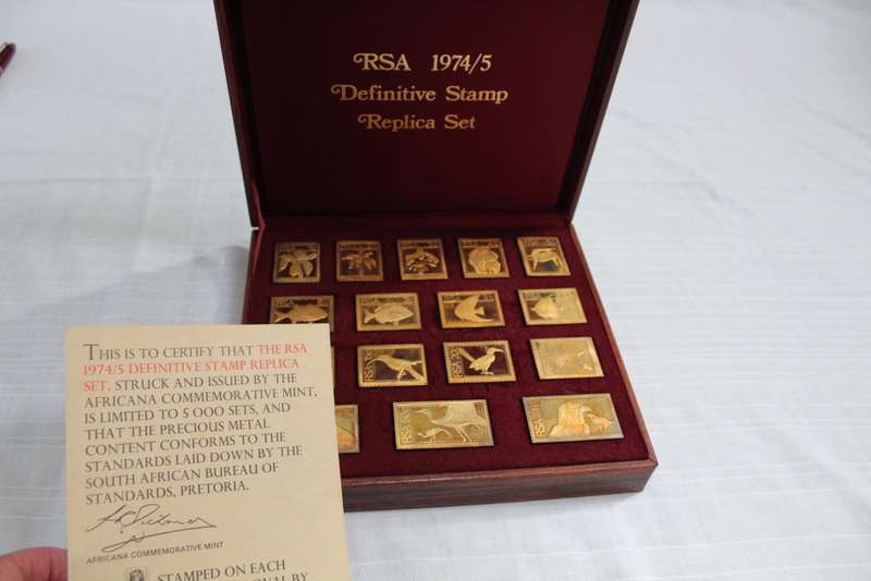 Sterling silver stamp set in wooden box.....hoarding silver??