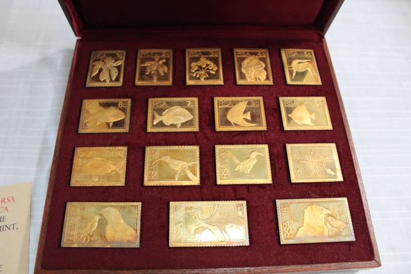 Sterling silver stamp set in wooden box.....hoarding silver??