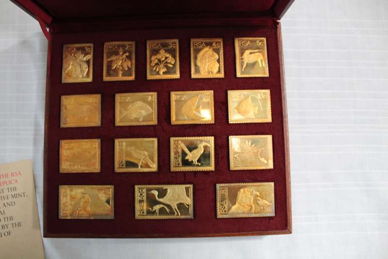 Sterling silver stamp set in wooden box.....hoarding silver??