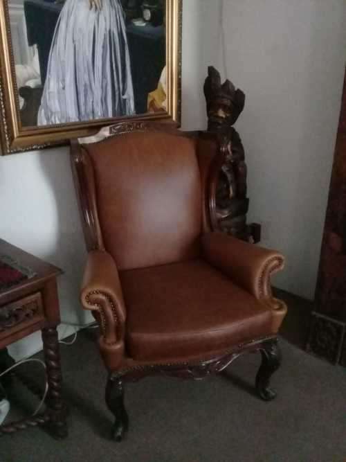 1882 Hand carved Leather Wingback chair
