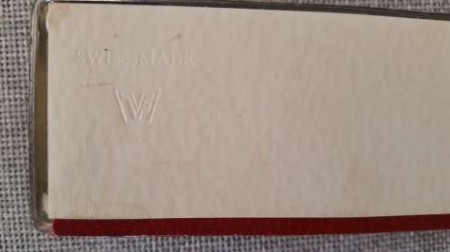 1960's RED HINGED OMEGA WATCH PRESENTATION BOX.