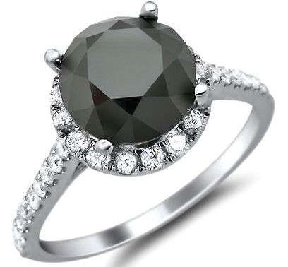 STUNNING 10K SOLID WHITE GOLD BLACK AND WHITE DIAMOND RING. 2.670CTS ! VALUE: R27'600.00