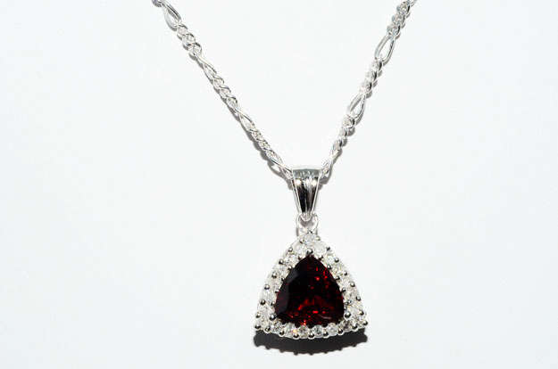 STUNNING GARNET AND WHITE DIAMOND NECKLACE SET IN SOLID STERLING SILVER. 2.360CTS ERV: R14'998.00