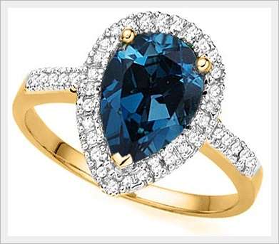 STUNNING 10k SOLID YELLOW GOLD LONDON BLUE TOPAZ AND DIAMOND RING 2.350CTS ERV: R19'211.00