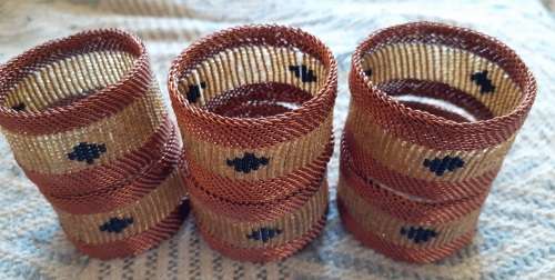 Elegant copper wire serviette rings, set of 6. As new.