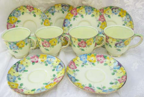 VINTAGE STAFFORDSHIRE ENGLAND FINE BONE CHINA HAND PAINTED COFFEE CUPS AND SAUCERS.