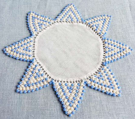 VINTAGE BEADED DOILY, CREAM AND BLUE....WITH A TULLE CENTERPIECE.