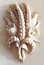 ANTIQUE  IVORY CASED NOTEBOOK AND PENCIL,  FRONT COVER DECORATED WITH WHEAT AND FIELD FLOWERS