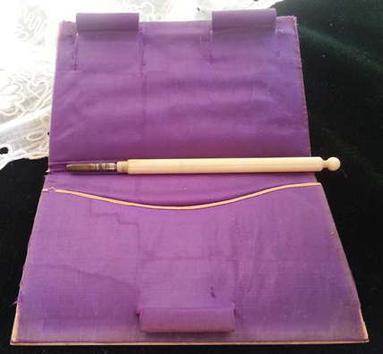 ANTIQUE  IVORY CASED NOTEBOOK AND PENCIL,  FRONT COVER DECORATED WITH WHEAT AND FIELD FLOWERS