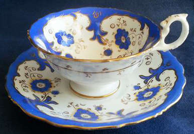 LARGE  HAND PAINTED,  VICTORIAN FOOTED DUO, BLUE FLOWERS ON WHITE PORCELAIN WITH GILDING.