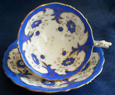 LARGE  HAND PAINTED,  VICTORIAN FOOTED DUO, BLUE FLOWERS ON WHITE PORCELAIN WITH GILDING.