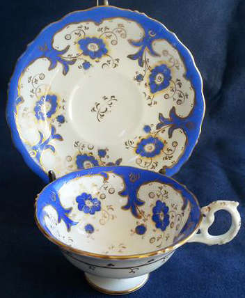 LARGE  HAND PAINTED,  VICTORIAN FOOTED DUO, BLUE FLOWERS ON WHITE PORCELAIN WITH GILDING.