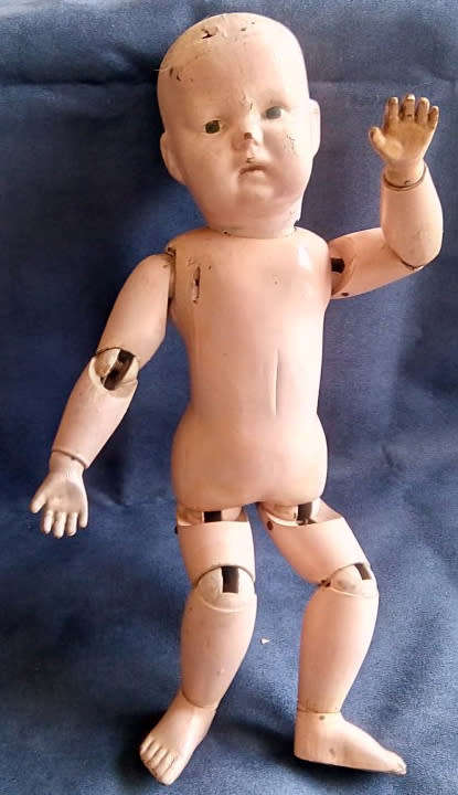 1913 H.E SCHOENHUT GERMAN, CARVED DOLL, SPRING LOADED JOINTS