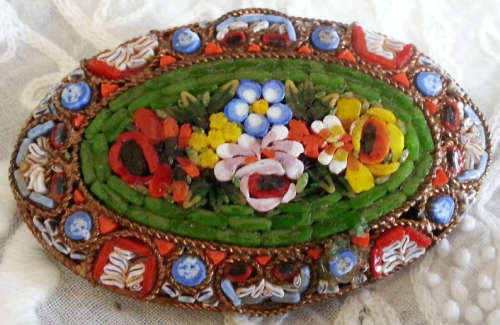 LARGE VINTAGE, OVAL SHAPED MICRO MOSAIC BROOCH, MADE IN ITALY, FLORAL DESIGN.