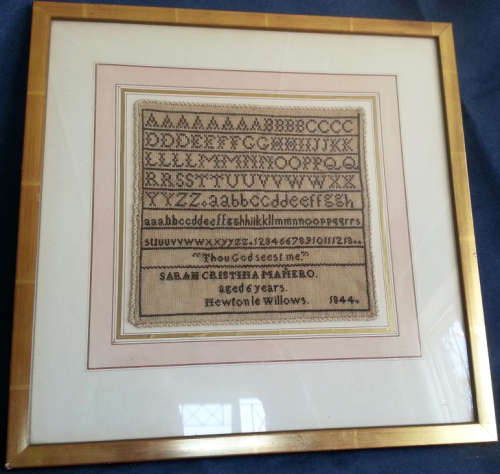 1844 SAMPLER SEWN BY 6 YEAR OLD SARAH CRISTINA MANERO,  BLACK ON WHITE COUNTED CROSS STITCH