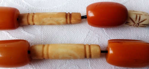 UPCYCLED  BEAD NECKLACE, USING 11 VINTAGE BUTTERSCOTCH BAKELITE BEADS, BONE, AND METAL