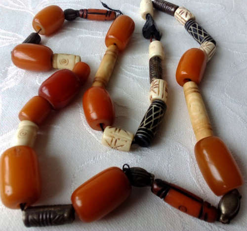 UPCYCLED  BEAD NECKLACE, USING 11 VINTAGE BUTTERSCOTCH BAKELITE BEADS, BONE, AND METAL