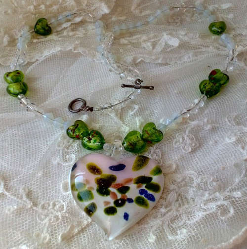 A BEAUTIFUL AND UNUSUAL MURANO BOHO BOHEMIAN , SILVER FOIL, HEART BEAD NECKLACE WITH HEART PENDANT