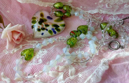 A BEAUTIFUL AND UNUSUAL MURANO BOHO BOHEMIAN , SILVER FOIL, HEART BEAD NECKLACE WITH HEART PENDANT