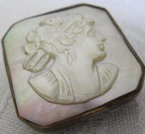 ANTIQUE, MOTHER OF PEARL, HAND CUT CAMEO BROOCH.
