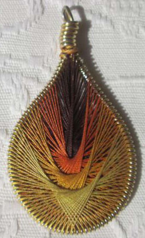 MULTI COLOURED, FINE STRING ART PENDANT STRAIGHT FROM THE 60s
