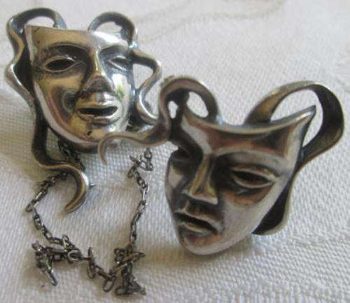 INTERESTING AND UNUSUAL.....SILVER BROOCH,  THEATRE COMEDY AND TRAGEDY PAIR OF MASKS WITH CHAIN
