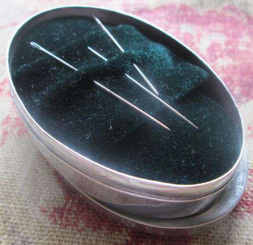 OVAL SHAPED,  ANTIQUE SILVER PLATED NEEDLE BOX, VELVET LINED., LID WITH MIRROR