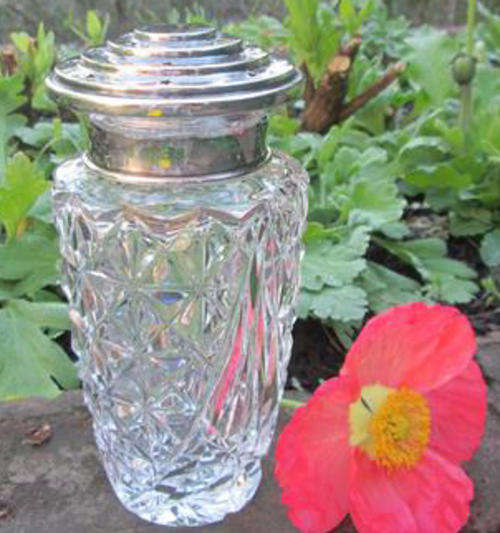 1937 ALMOST ANTIQUE CUT CRYSTAL SUGAR CASTER WITH A HALL MARKED SILVER TOP