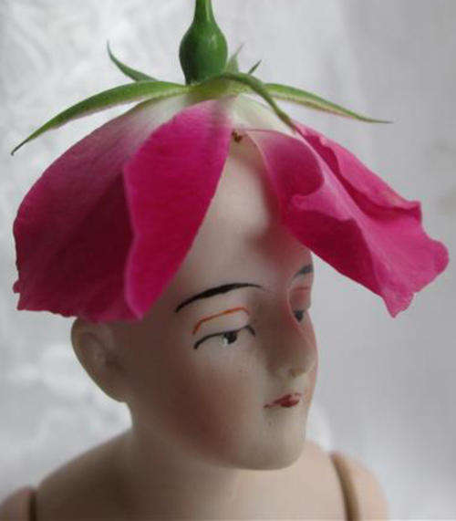 LARGE ANTIQUE, HAND PAINTED  BISQUE PORCELAIN PIN CUSHION / TEA COSY HALF DOLL WITH MOVING ARMS..