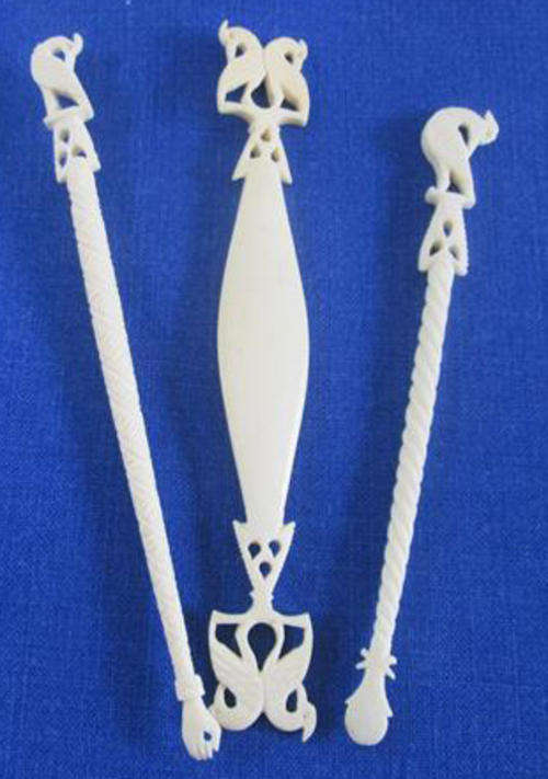 UNUSUAL AND COLLECTABLE...EGYPTIAN DESIGN...SET OF THREE ANTIQUE VICTORIAN, CARVED BONE SEWING AIDS