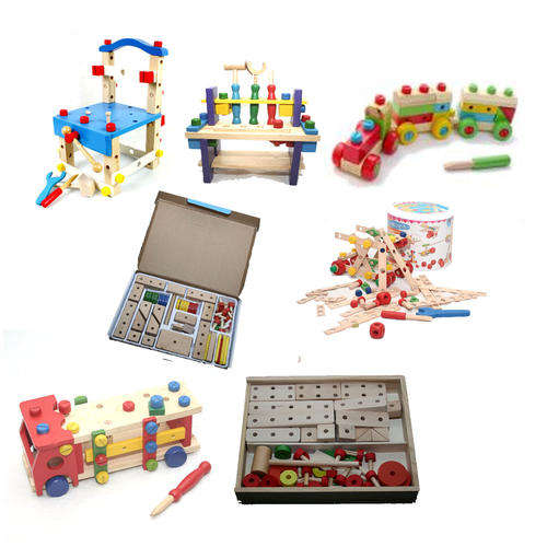 Collection of different wooden nuts and bold toys
