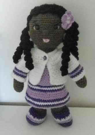 Crocheted african doll-