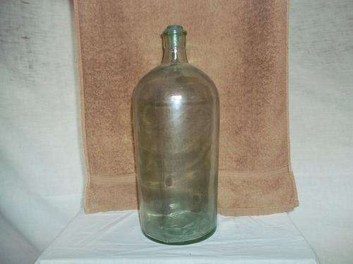 Glass bottle with tapper glass plug