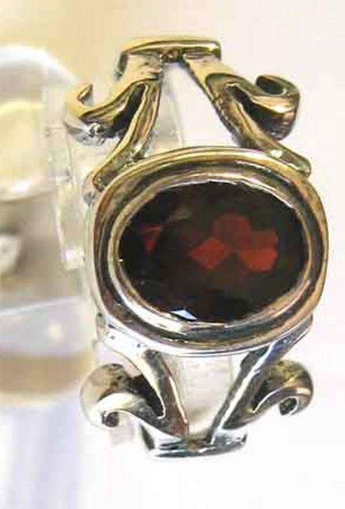 Sterling Silver & Genuine Garnet Ring.