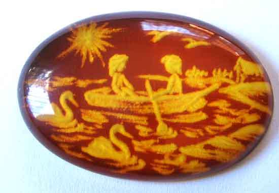 41.00 x 37.00 mm Oval curved Amber 25.52 cts