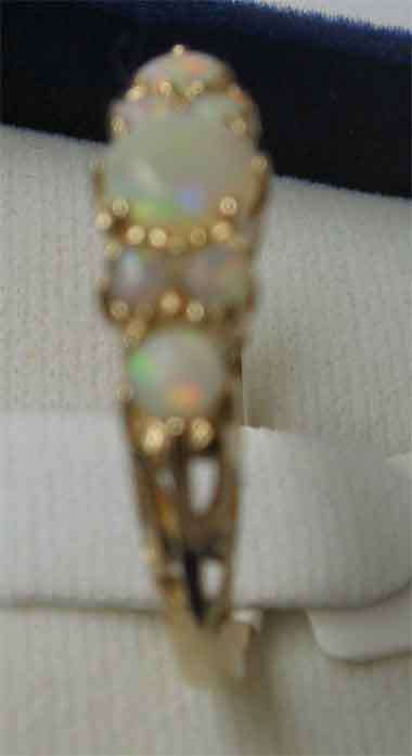 9K Solid Gold and Genuine Opals Ring.