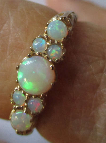 9K Solid Gold and Opals  Ring.