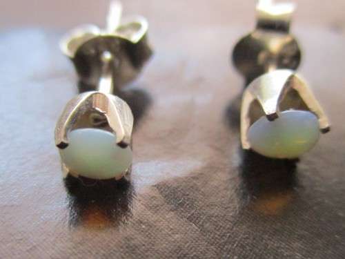A Pair of Sterling Silver and Australian Opals Earrings