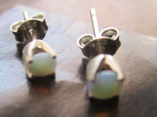 A Pair of Sterling Silver and Australian Opals Earrings